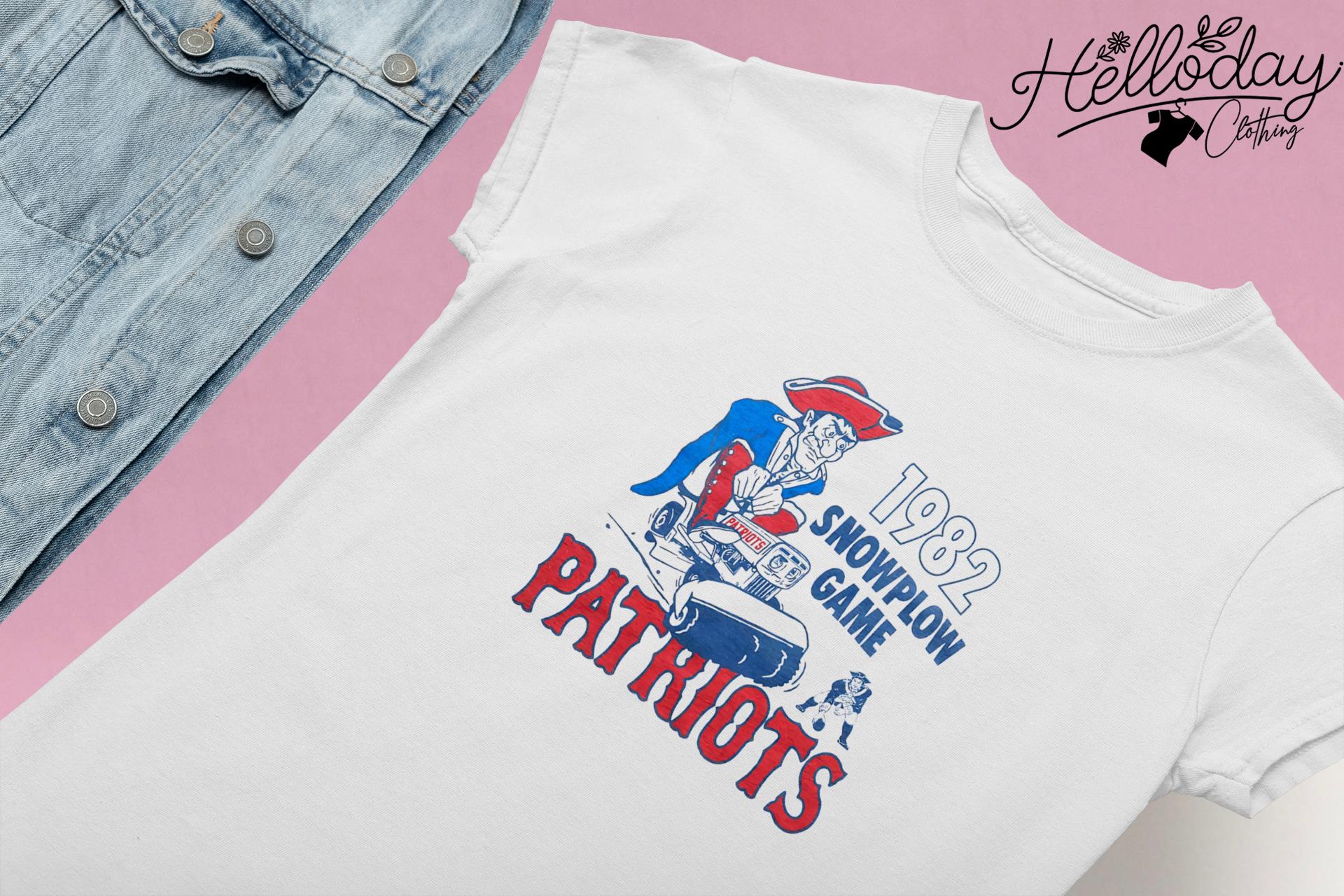 New England Patriots 1982 Snow Plow Game T-Shirt from Homage. | Officially Licensed Vintage NFL Apparel from Homage Pro Shop.